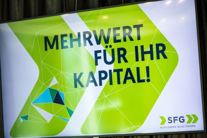 Bildschirm mit "Mehrwert für Ihr Kapital!"