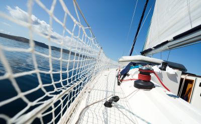 Portrait of sailing sport boat on open sea